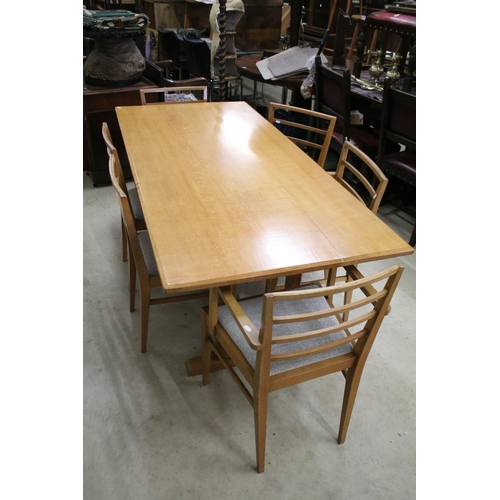 597 - In the manner of Heals of London, Pale Oak Rectangular Dining Room Table with chamfered edge, raised... 