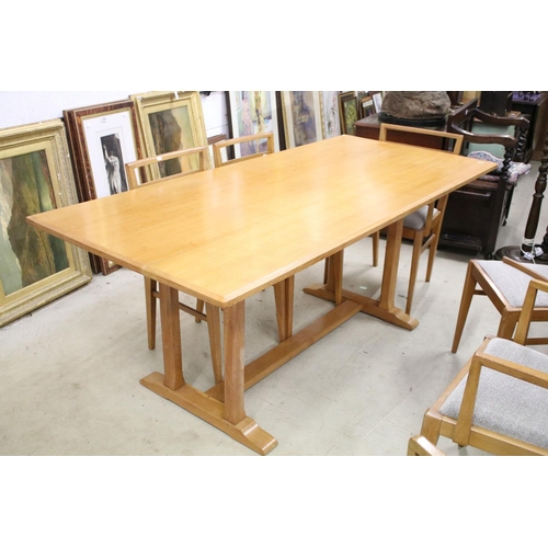 597 - In the manner of Heals of London, Pale Oak Rectangular Dining Room Table with chamfered edge, raised... 