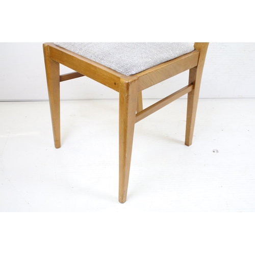 597 - In the manner of Heals of London, Pale Oak Rectangular Dining Room Table with chamfered edge, raised... 