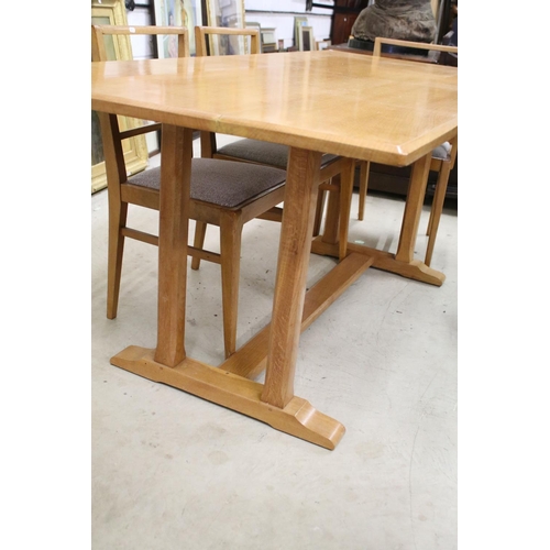 597 - In the manner of Heals of London, Pale Oak Rectangular Dining Room Table with chamfered edge, raised... 