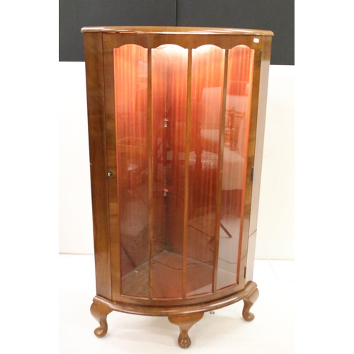 604 - 1930's Walnut Bow Front Glazed Display Cabinet, the single door opening to two glass shelves, 117cm ... 