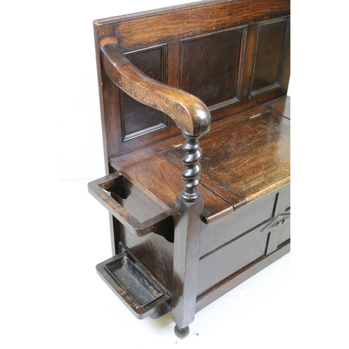 618 - Early to Mid 20th century Oak Hall Seat with panelled back and lift up hinged box seat, the arms wit... 