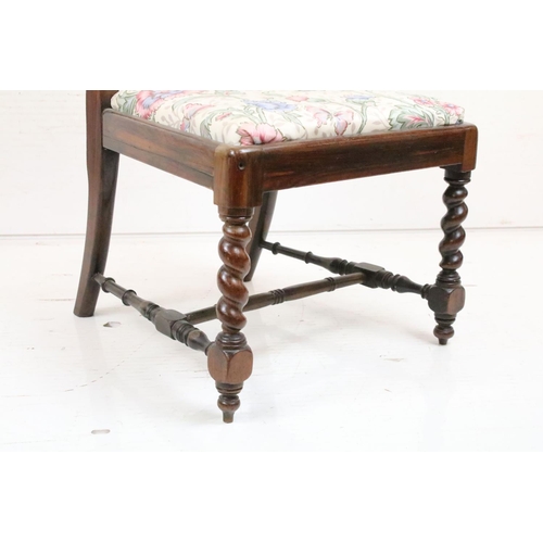 638 - 19th century Rosewood Nursing or Low Chair with barley-twist carved supports, upholstered back panel... 