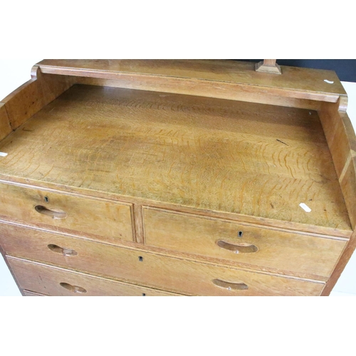 605 - Arts and Crafts Chestnut Dressing Chest with swing mirror over a chest of two short and four long dr... 