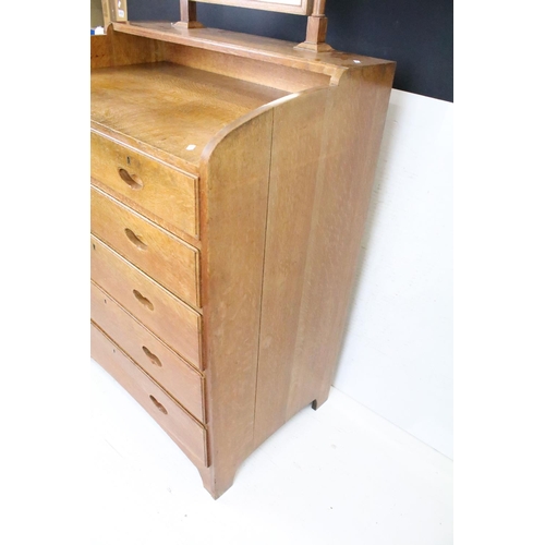 605 - Arts and Crafts Chestnut Dressing Chest with swing mirror over a chest of two short and four long dr... 