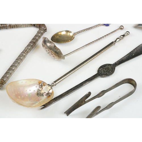 209 - A small collection of mixed silver and silver plated cutlery to include napkin ring, knife rests, sp... 