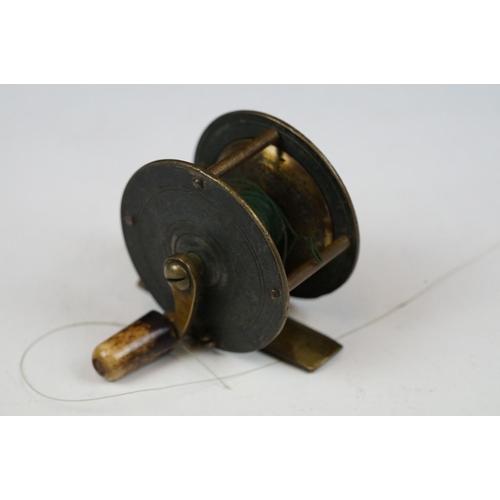 213 - A collection of three early 20th century fly fishing reels to include the 'WEY' Mk.1