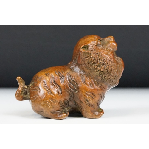 218 - An ornamental Chinese bronze tiger, stands approx 4cm in height.