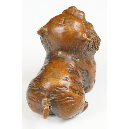 218 - An ornamental Chinese bronze tiger, stands approx 4cm in height.