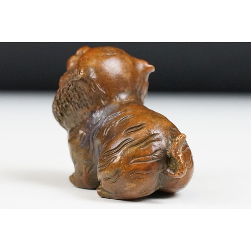 218 - An ornamental Chinese bronze tiger, stands approx 4cm in height.