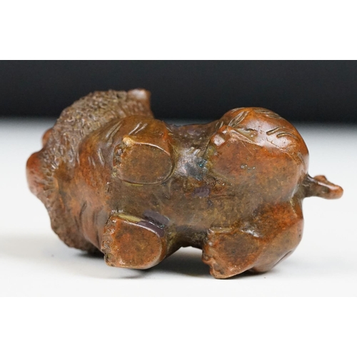 218 - An ornamental Chinese bronze tiger, stands approx 4cm in height.