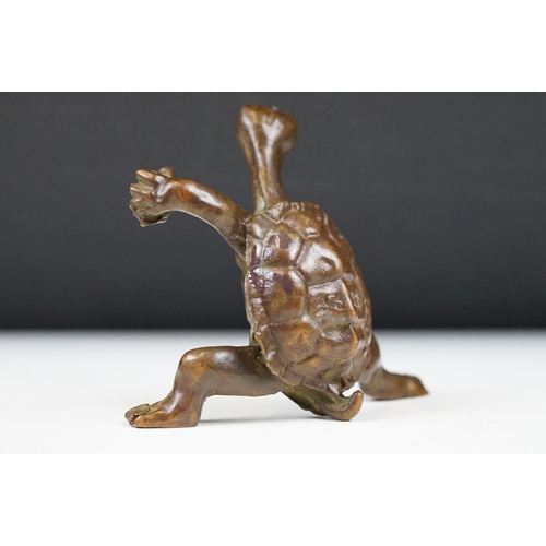 219 - An oriental lucky turtle ornament with character marks, stands approx 6cm in height.