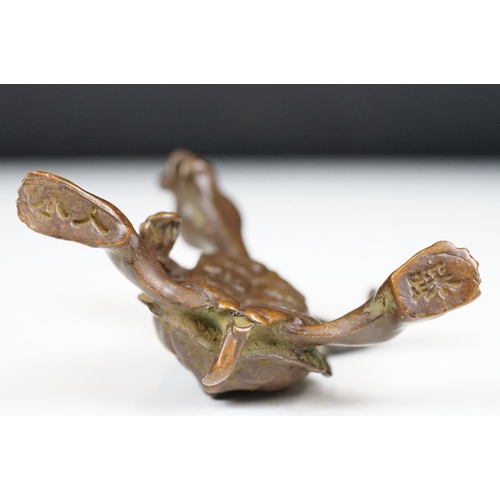 219 - An oriental lucky turtle ornament with character marks, stands approx 6cm in height.