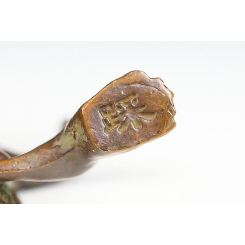 219 - An oriental lucky turtle ornament with character marks, stands approx 6cm in height.