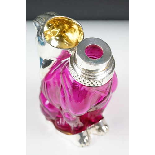 221 - Pink Glass Decanter in the form of a Dog with Silver Plated mounts