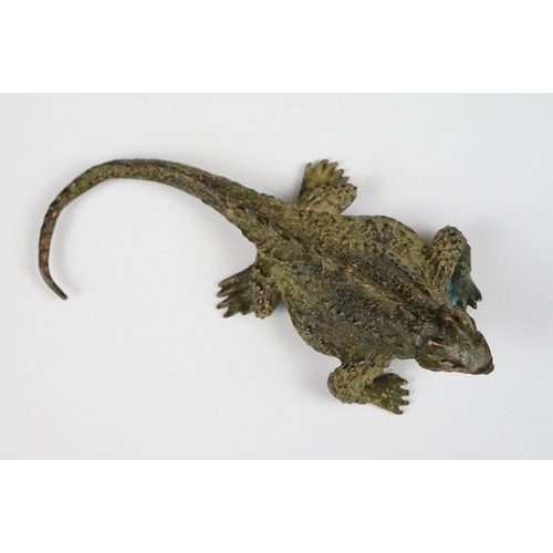 225 - A Chinese ornamental bronze figure of a lizard, approx 9cm in length.