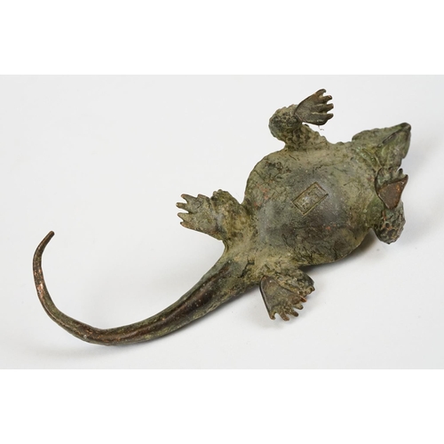 225 - A Chinese ornamental bronze figure of a lizard, approx 9cm in length.