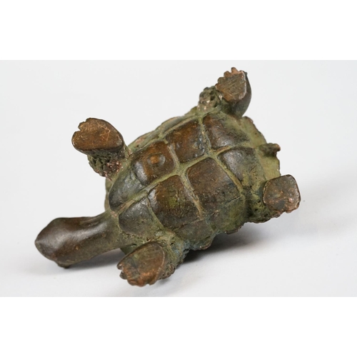 226 - A Chinese ornamental bronze figure of a tortoise, approx 5cm in length.