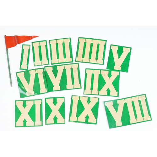 227 - A collection of tin plate Roman numeral markers together with a red tin plate flag.