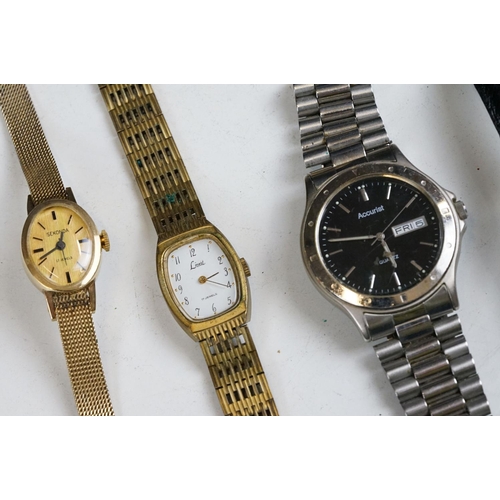 230 - A collection of ladies and gents wristwatches to include Limit, Sekonda and Accurist examples.