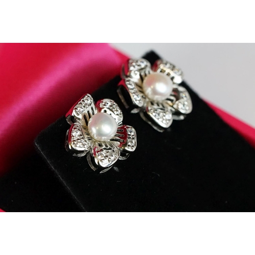 244 - Pair of Silver Flower Head Pearl Panelled Stud Earrings