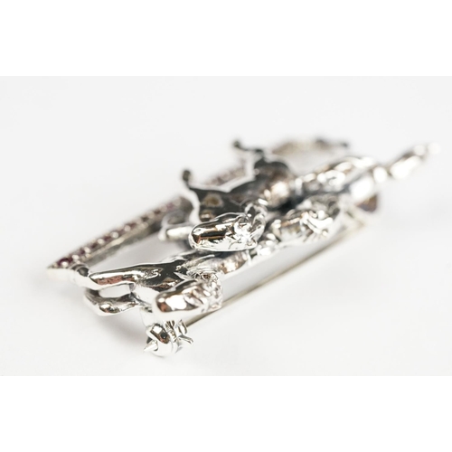 251 - Silver Horse Brooch set with a Ruby platform