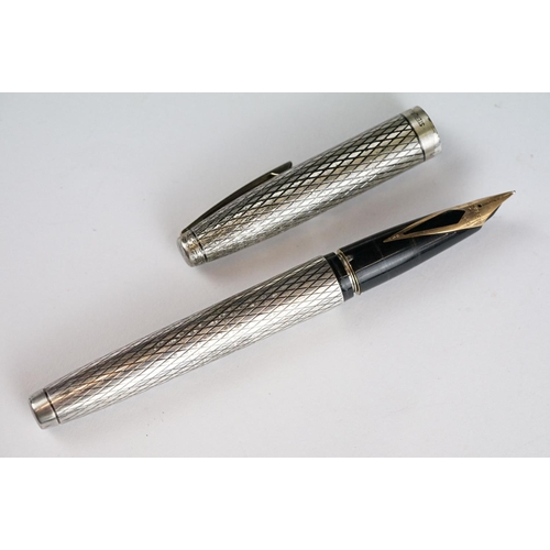 254 - A Sheaffer sterling silver three piece pen and pencil set, to include fountain pen with 14ct gold ni... 