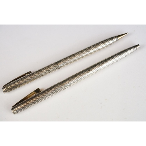 254 - A Sheaffer sterling silver three piece pen and pencil set, to include fountain pen with 14ct gold ni... 