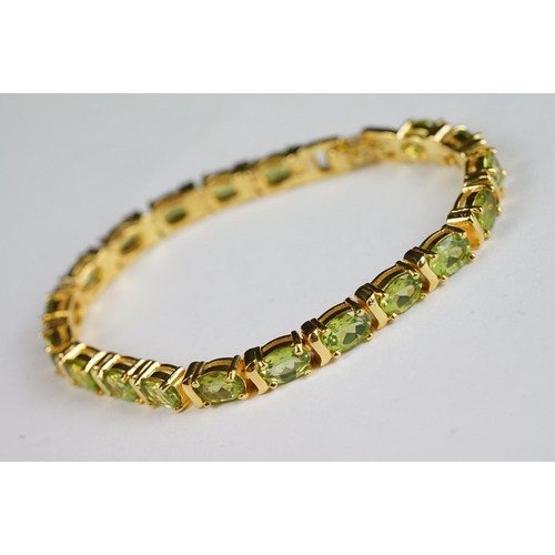 256 - Silver and Peridot Line Bracelet