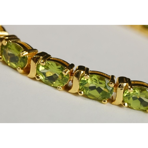 256 - Silver and Peridot Line Bracelet