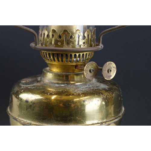 129 - 20th Century oil lamp with Austrian white glass shade, chimney, and a gilt metal reservoir & foot. M... 