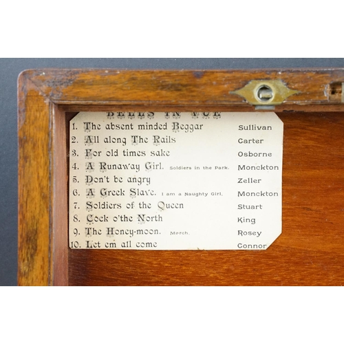 133 - 19th Century music box, the mahogany case opening to a 6.25