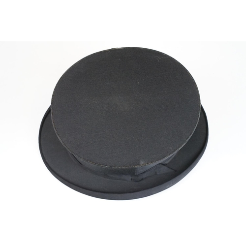 159 - Early 20th Century Henry Heath collapsible top hat together with a leather bound travel case with bl... 