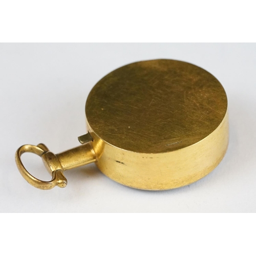 269 - An early 20th century pocket compass within original protective case.