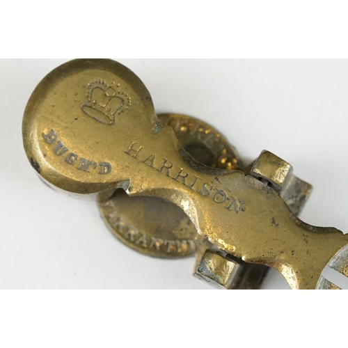 275 - A set of antique brass sovereign scales together with a sovereign holder.