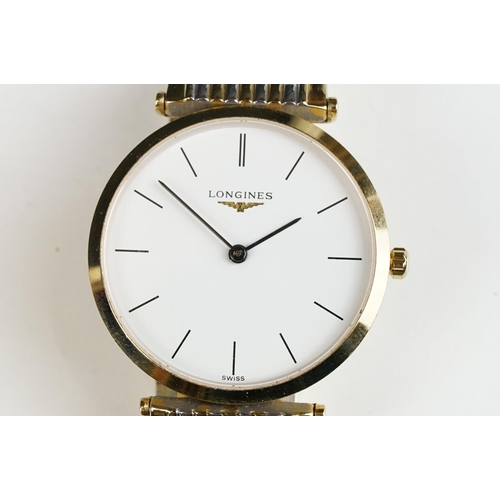 282 - A gents Le Grande Classic De Longines with white enamel dial on original bi metal strap, longines lo... 