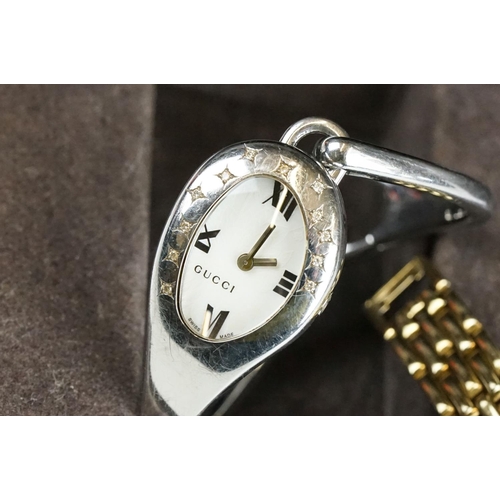 287 - A ladies Gucci stainless steel wristwatch with display box together with a ladies Seiko wristwatch.