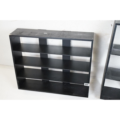 668 - Three Stained Black Wooden Wall Hanging Collector's Shelves, largest 64cm high x 60cm wide x 15cm de... 