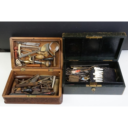 296 - A collection of early 20th century scissors and sewing items together with a mother of pearl manicur... 