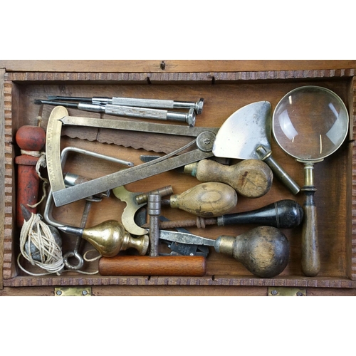 296 - A collection of early 20th century scissors and sewing items together with a mother of pearl manicur... 