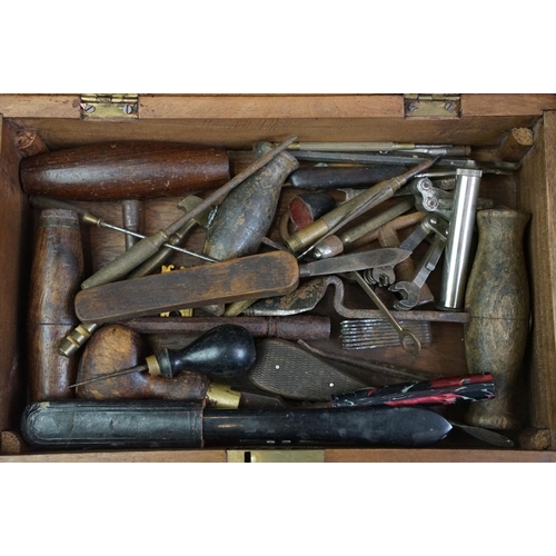 296 - A collection of early 20th century scissors and sewing items together with a mother of pearl manicur... 