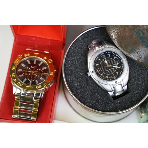 299 - A collection of ladies and gents wristwatches to include vintage and contemporary examples