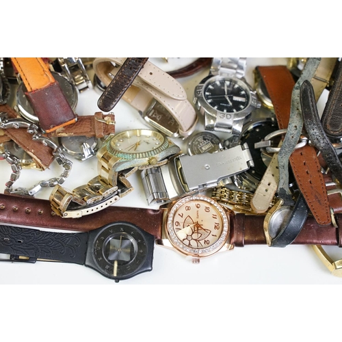 299 - A collection of ladies and gents wristwatches to include vintage and contemporary examples