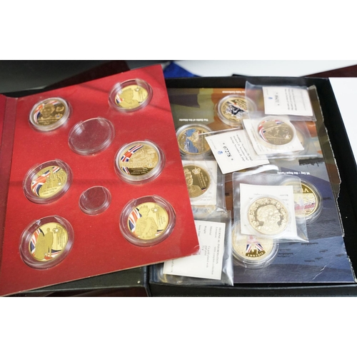 303 - A large collection of mainly proof collectors coins contained within collectors display cases.