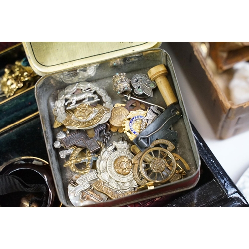 304 - A box of mixed collectables to include military badges, gold and silver jewellery, meerchaum pipe, m... 