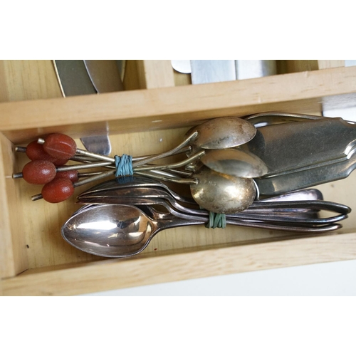 319 - A collection of mixed silver plated cutlery contained within two boxes