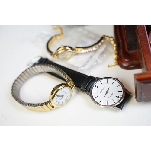 318 - A collection of vintage and contemporary wristwatches to include Roamer and Sekonda examples togethe... 