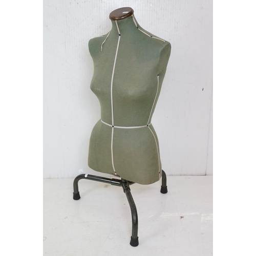 389 - Mid century Female Torso Dress Maker’s Dummy raised on a short three leg metal stand, 97cm high