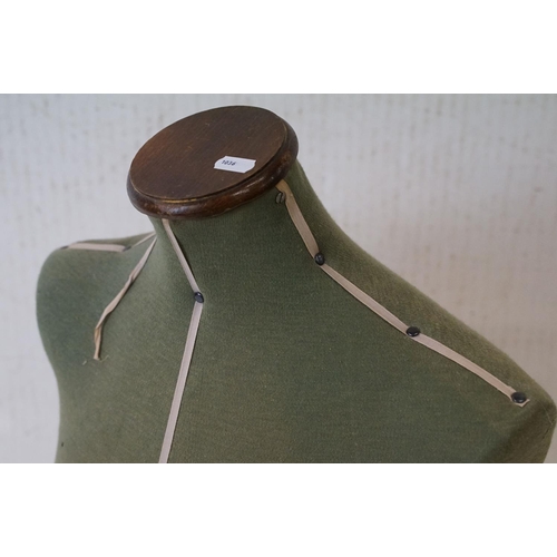 389 - Mid century Female Torso Dress Maker’s Dummy raised on a short three leg metal stand, 97cm high