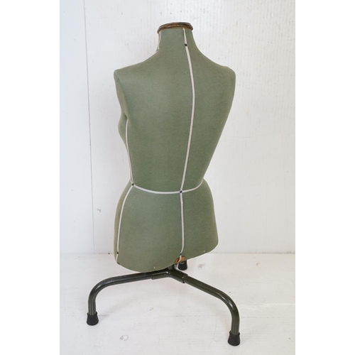 389 - Mid century Female Torso Dress Maker’s Dummy raised on a short three leg metal stand, 97cm high